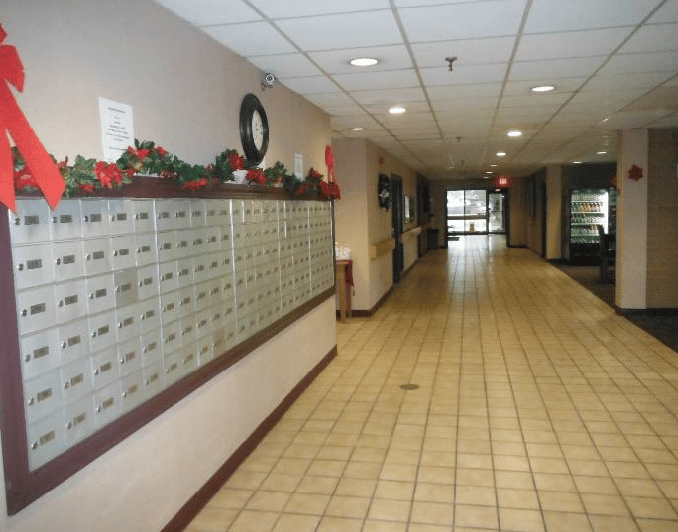 Interior hallway with mailboxes and holiday decorations