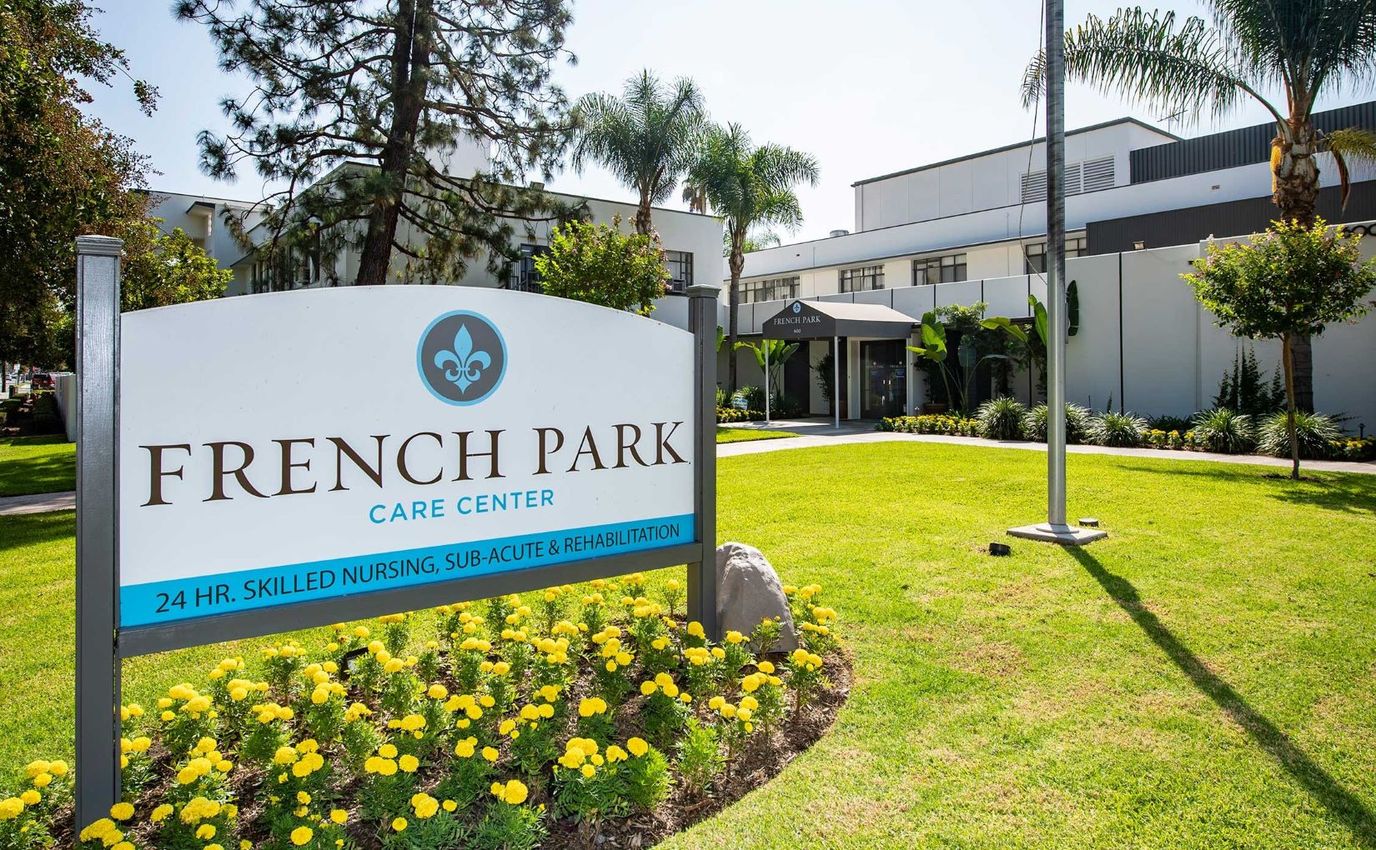 Exterior view of French Park Care Center with sign.