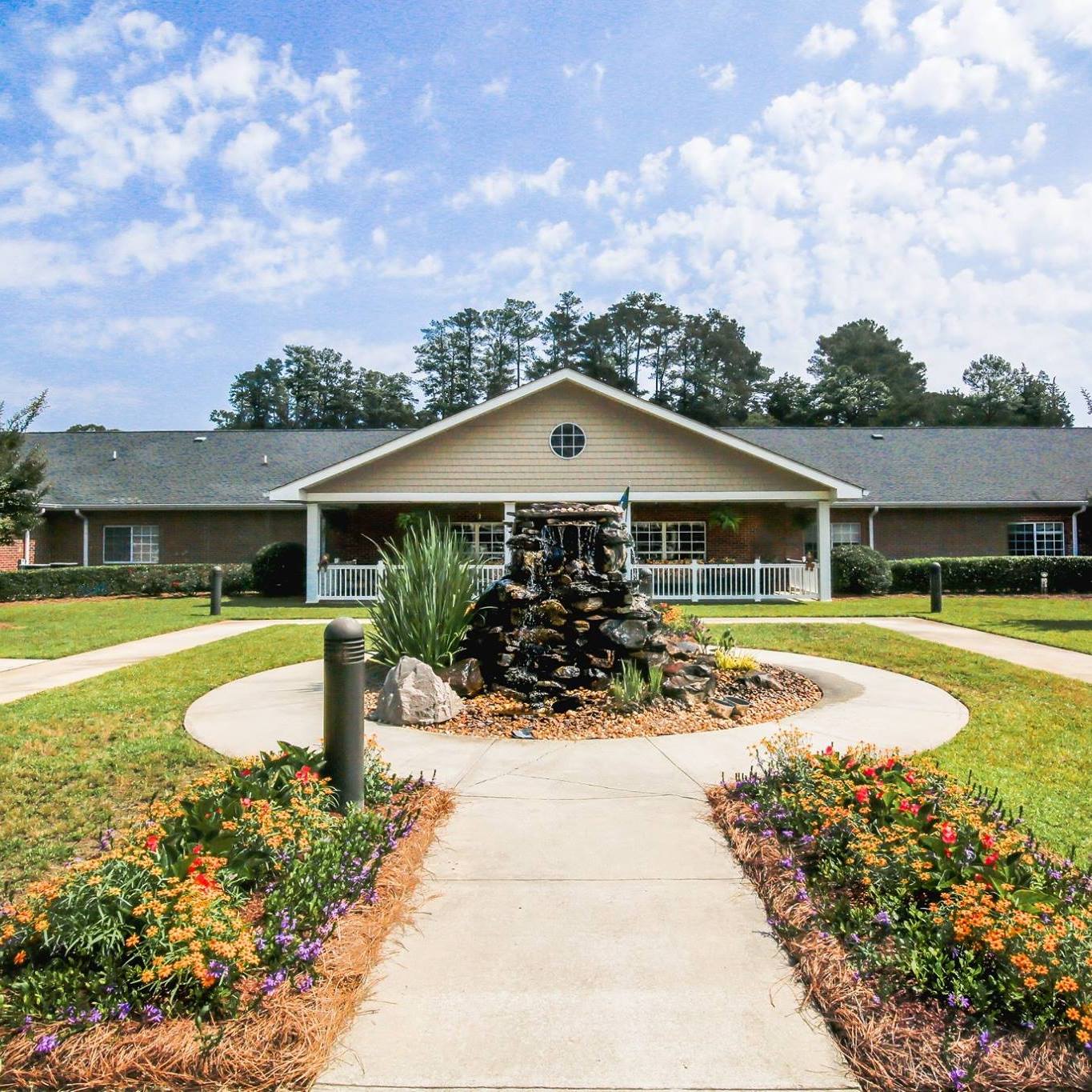Entrance of Haymount Rehabilitation & Nursing Center with garden