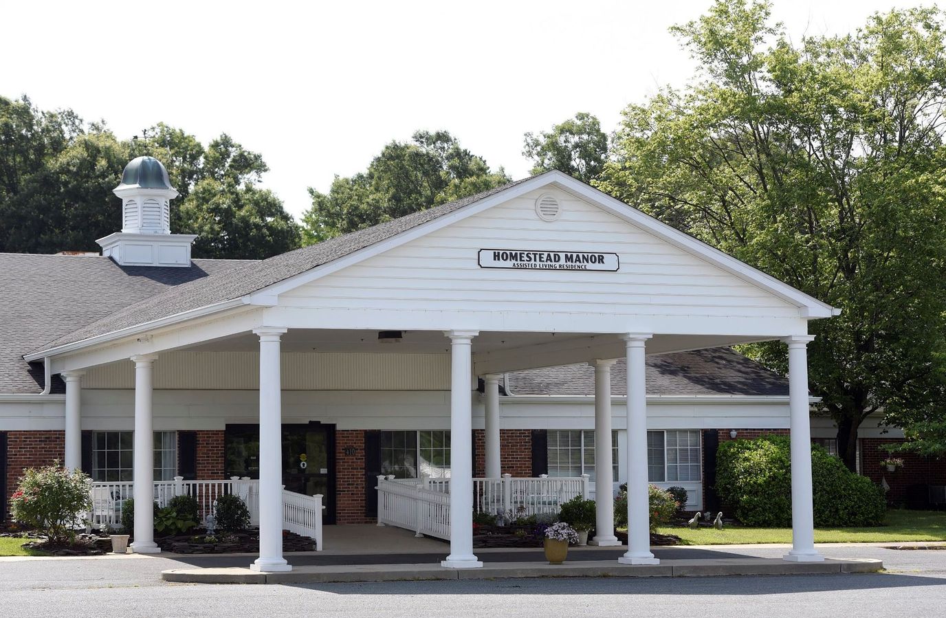 Exterior view of Homestead Manor Assisted Living building