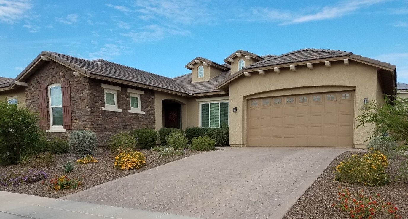 Exterior view of a residential building with landscaping