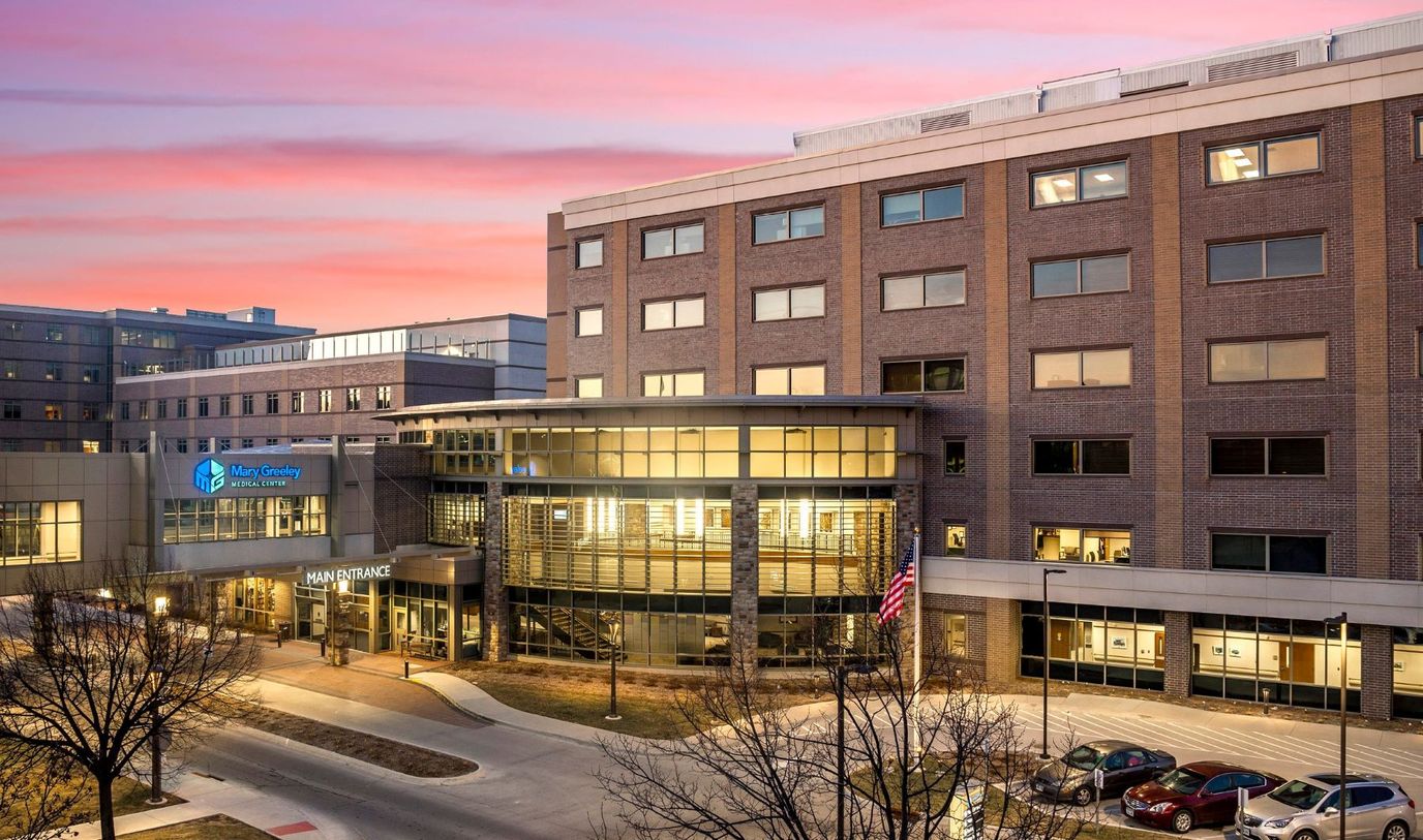 Exterior view of Mary Greeley Medical Center at sunset