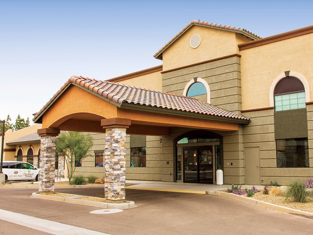 Entrance of Orchard Pointe at Surprise with a covered portico