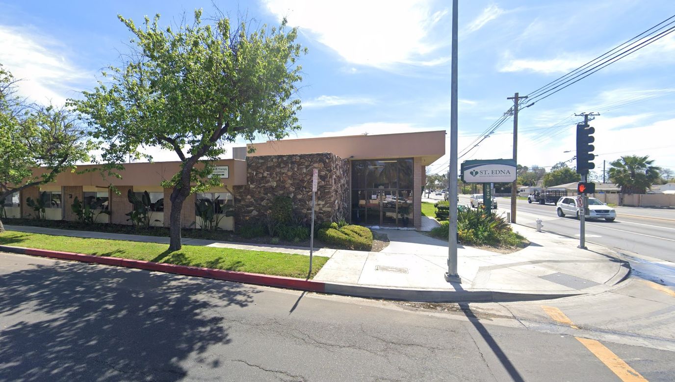 Exterior view of St. Edna Sub-Acute and Rehabilitation Center