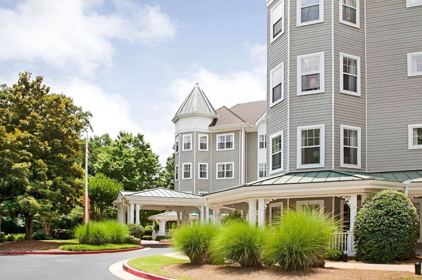 Exterior view of Sunrise of Decatur with gardens