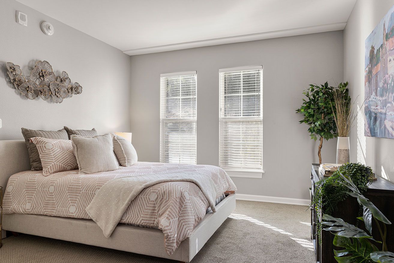Bright and inviting private resident room with bed and decor