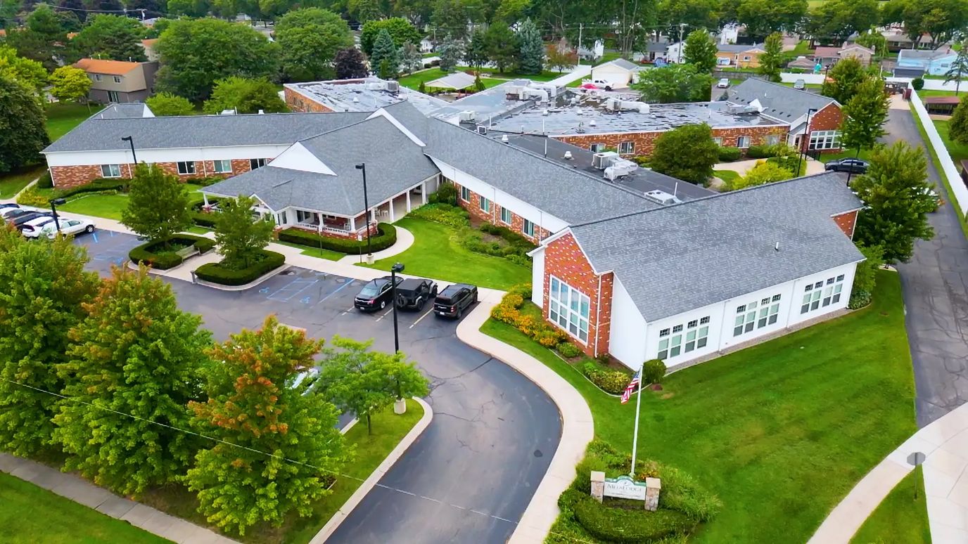 Aerial view of Medilodge of Monroe facility with landscaped grounds