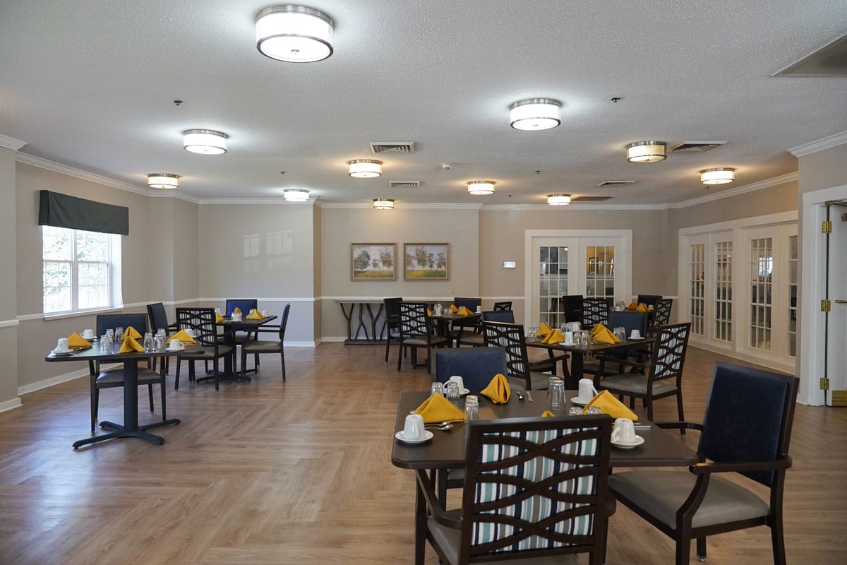Dining room with tables set for meals