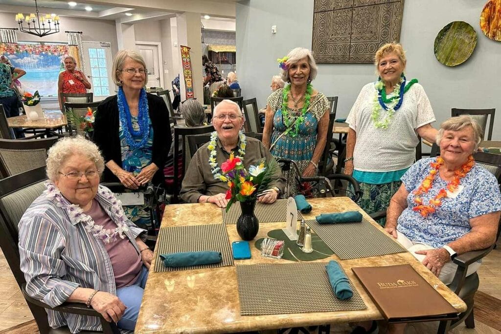 Residents celebrating together in a dining area