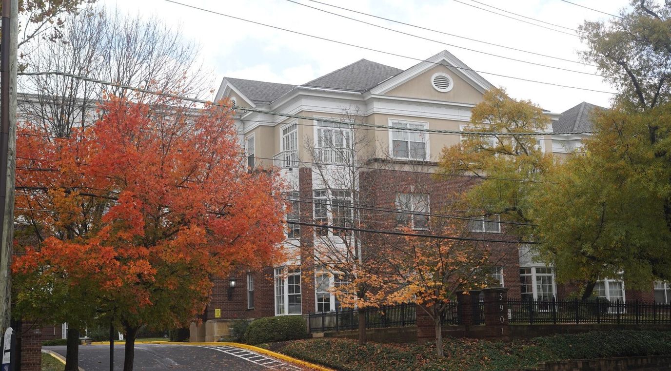 Building exterior of Grand Oaks Assisted Living surrounded by trees