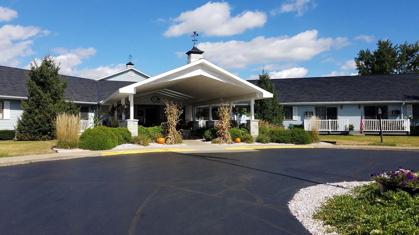 Front view of Arbor North Living Center with landscaping