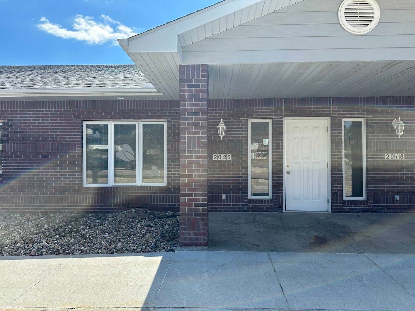 Exterior view of a senior living facility entrance