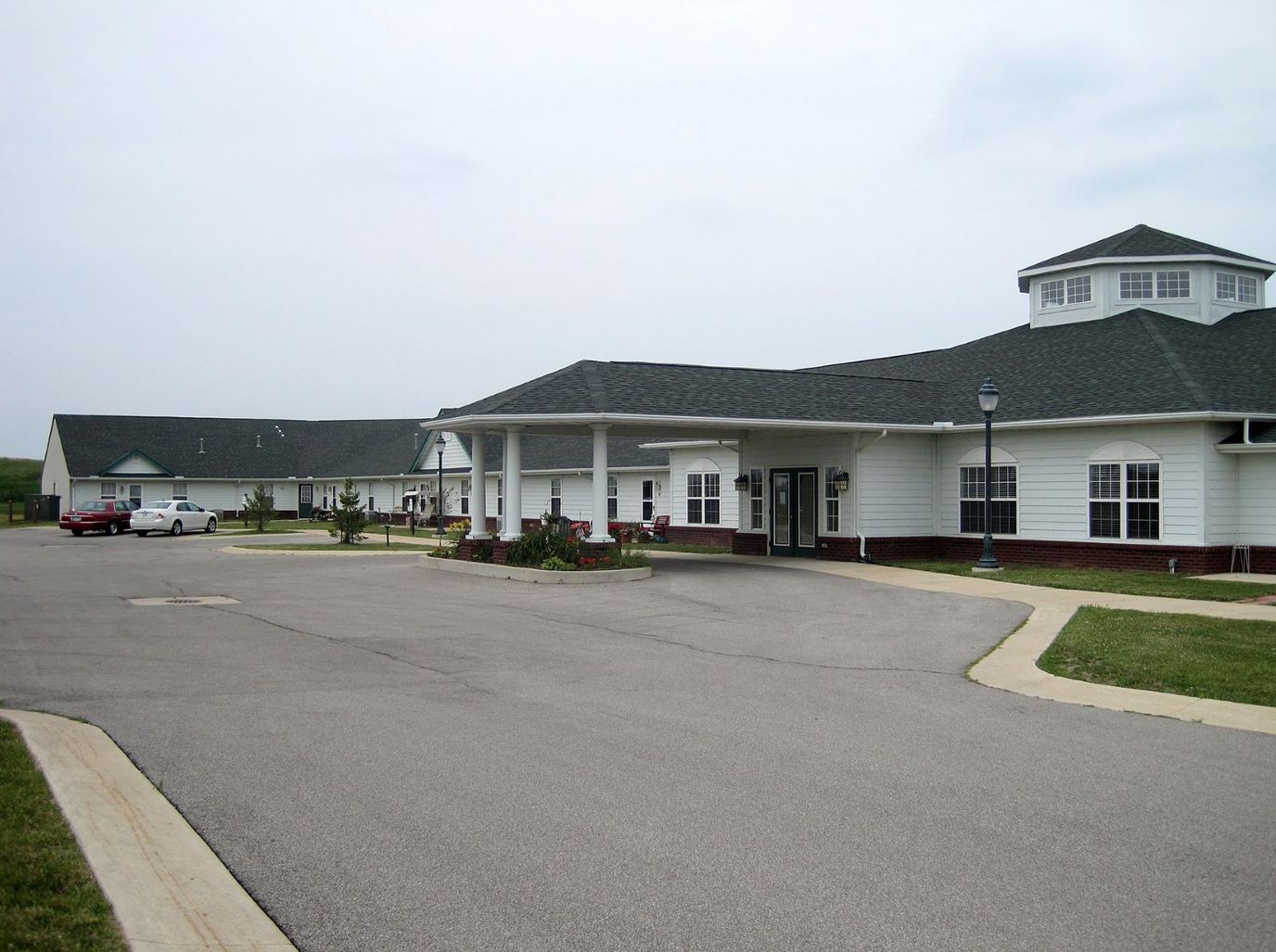 Exterior view of Eagle Springs facility with a parking lot
