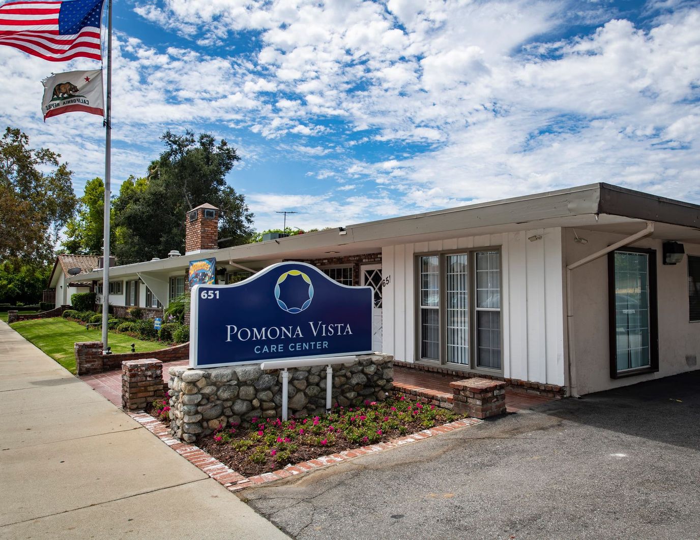 Exterior view of Pomona Vista Care Center building and sign