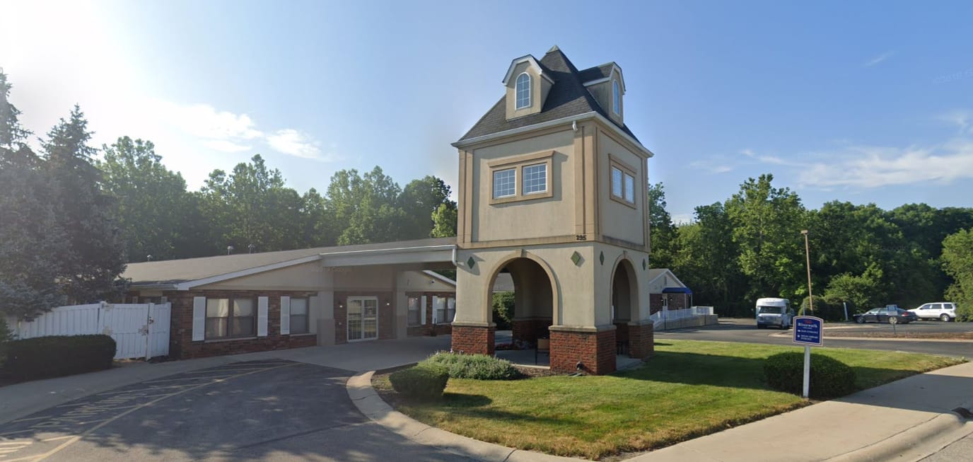 Exterior view of Riverwalk Village's entrance and architecture