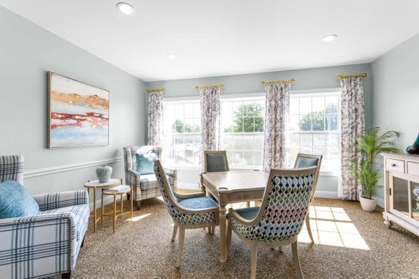 Bright interior common area with seating and natural light