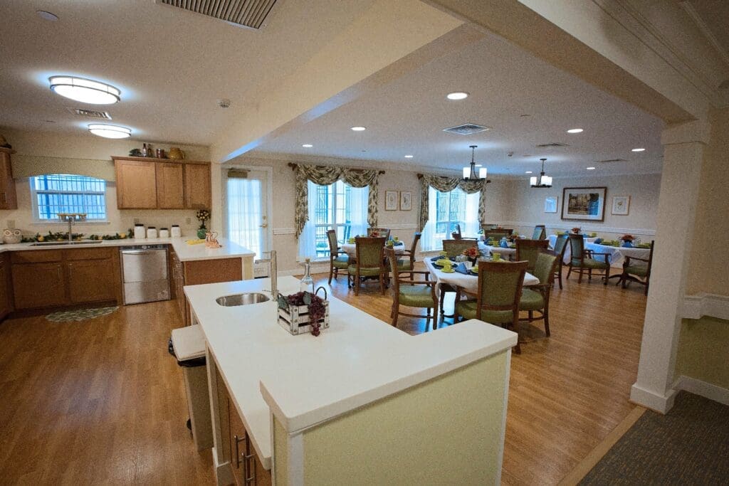 Bright and airy common area with seating for residents