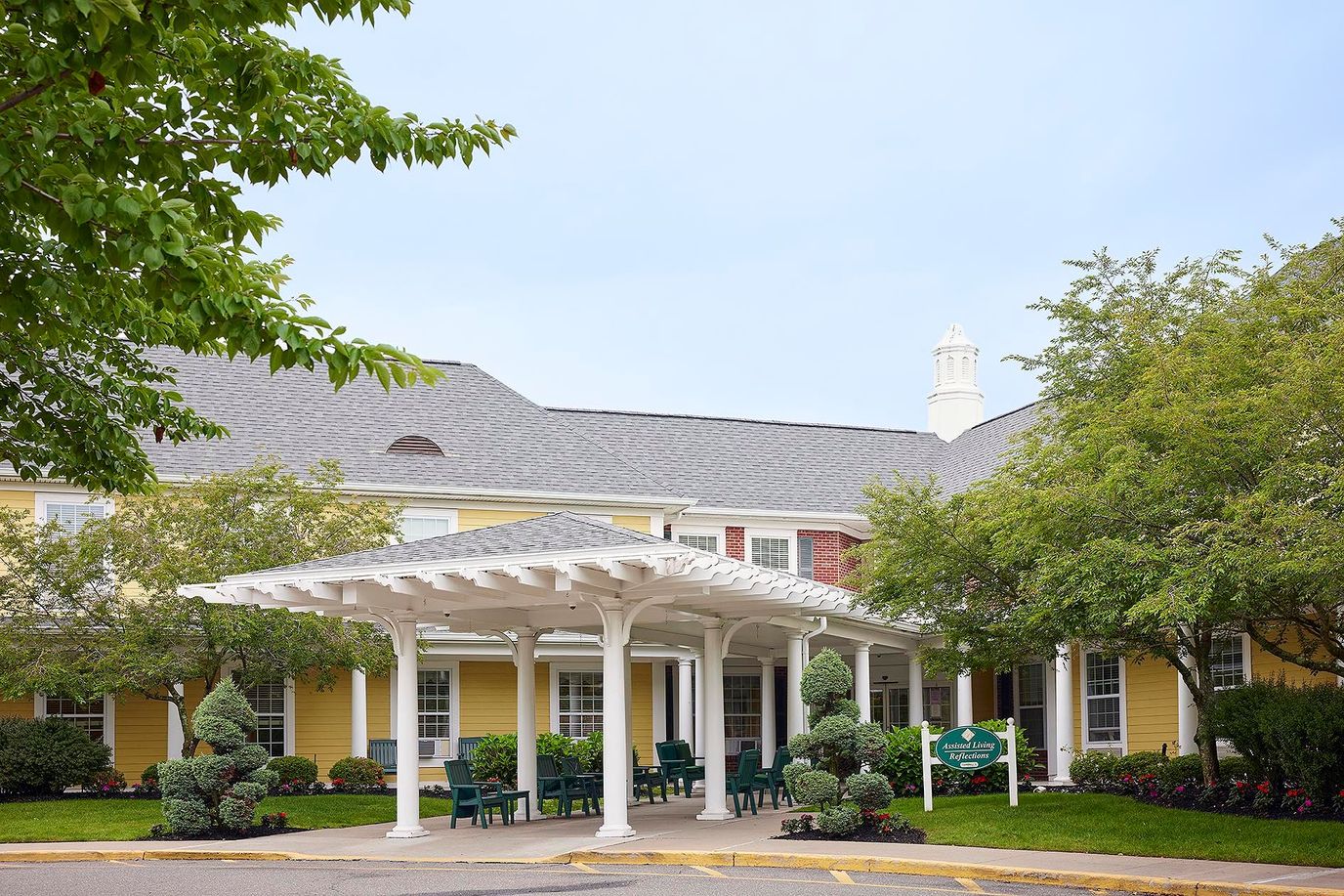 Building exterior with entrance and outdoor seating area
