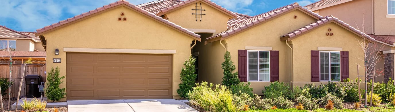 Exterior view of a residential building with landscaping