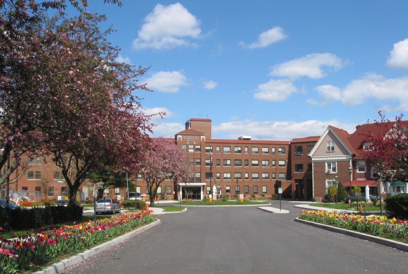 Exterior view of Providence Rest surrounded by flowers