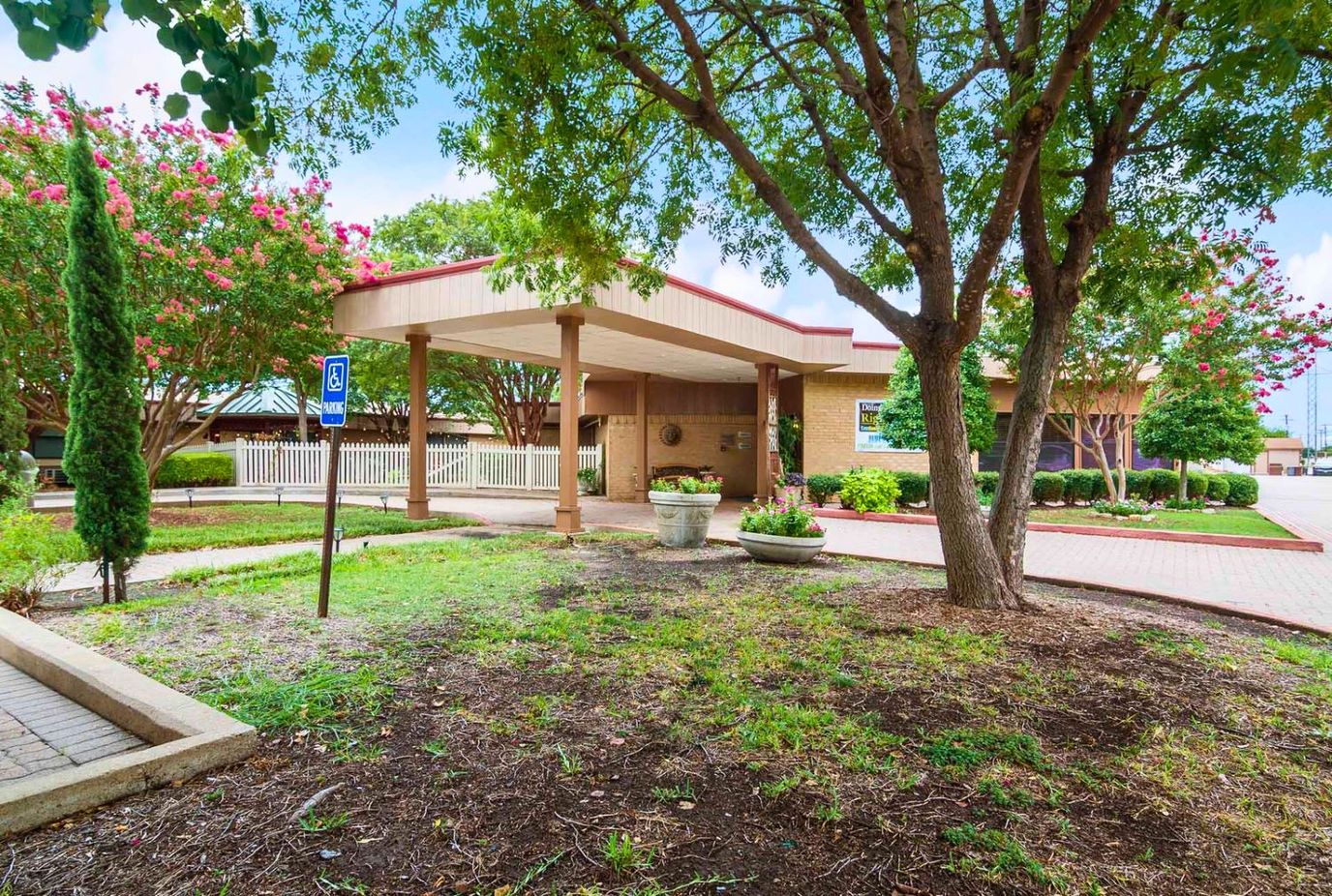 Entrance of The Park in Plano with landscaping
