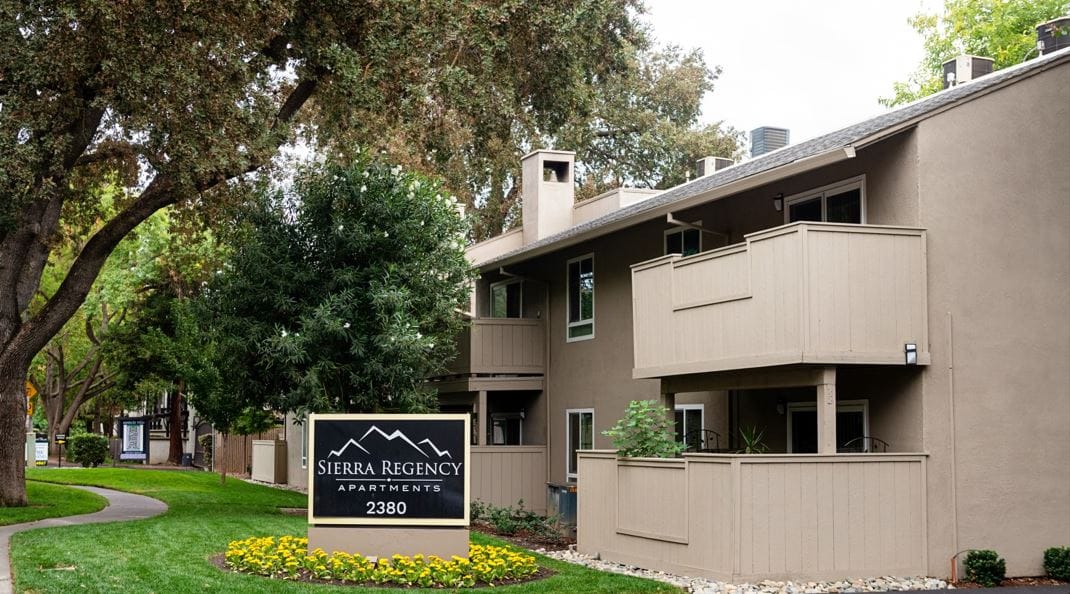 Exterior view of the Sierra Regency building with landscaping