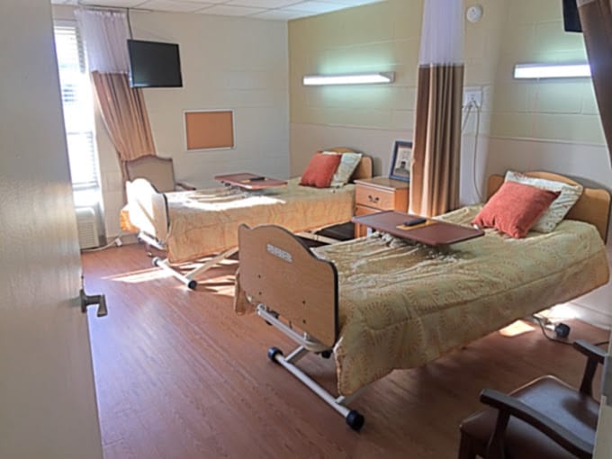 Interior view of a resident room with two beds