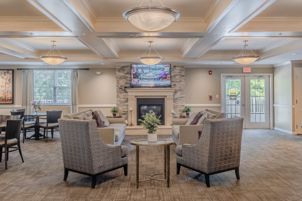 Common area with comfortable seating and a fireplace