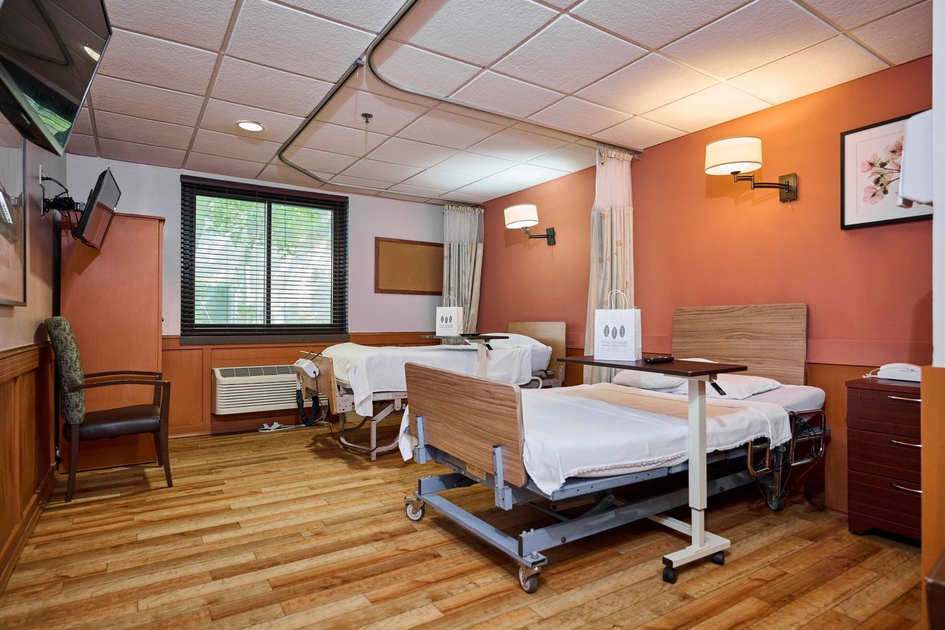 Interior view of a shared resident room with beds