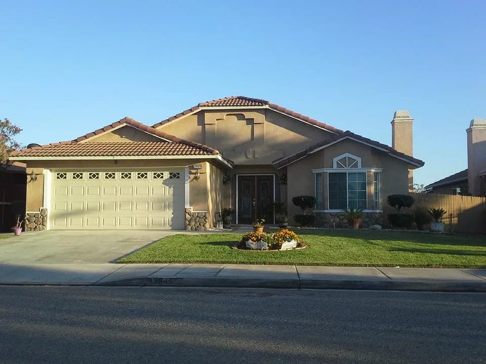 Exterior view of a residential building with landscaping