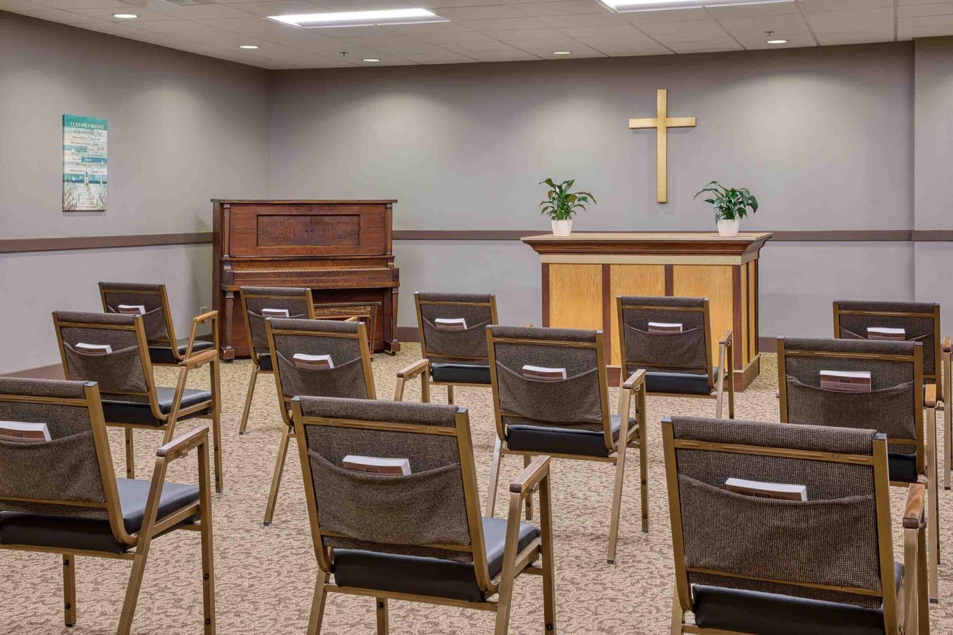 Chairs arranged in a quiet interior space.