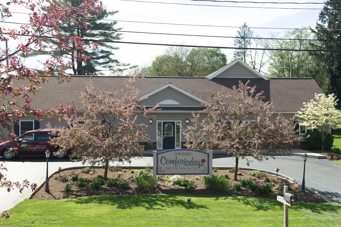 Exterior view of Comfort Today facility with flowers