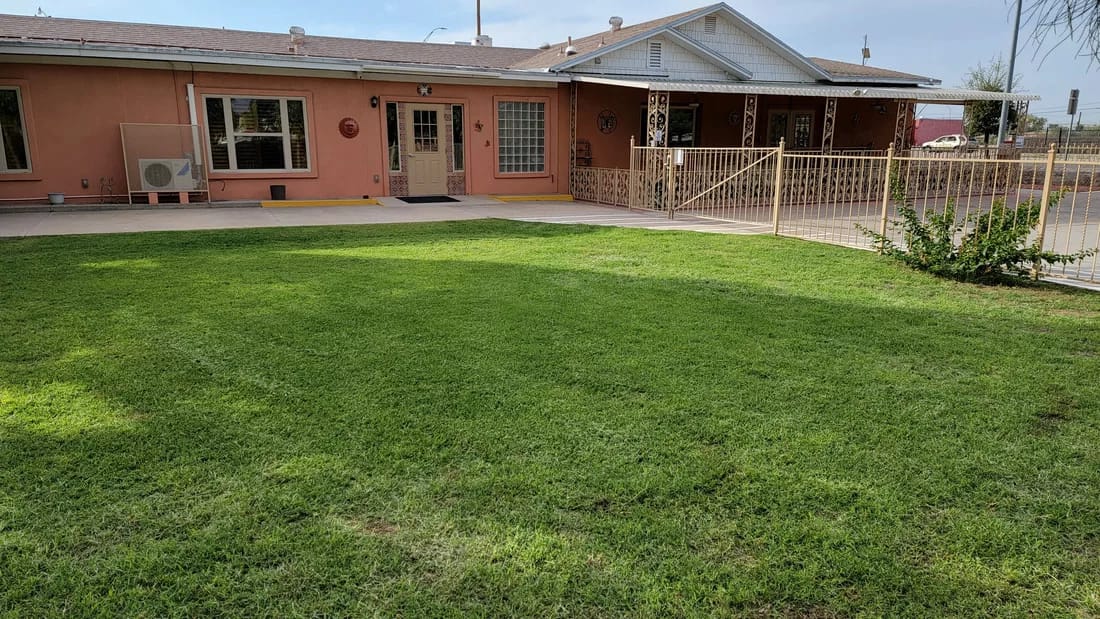 Exterior view of Casa De Bellamie with a grassy area