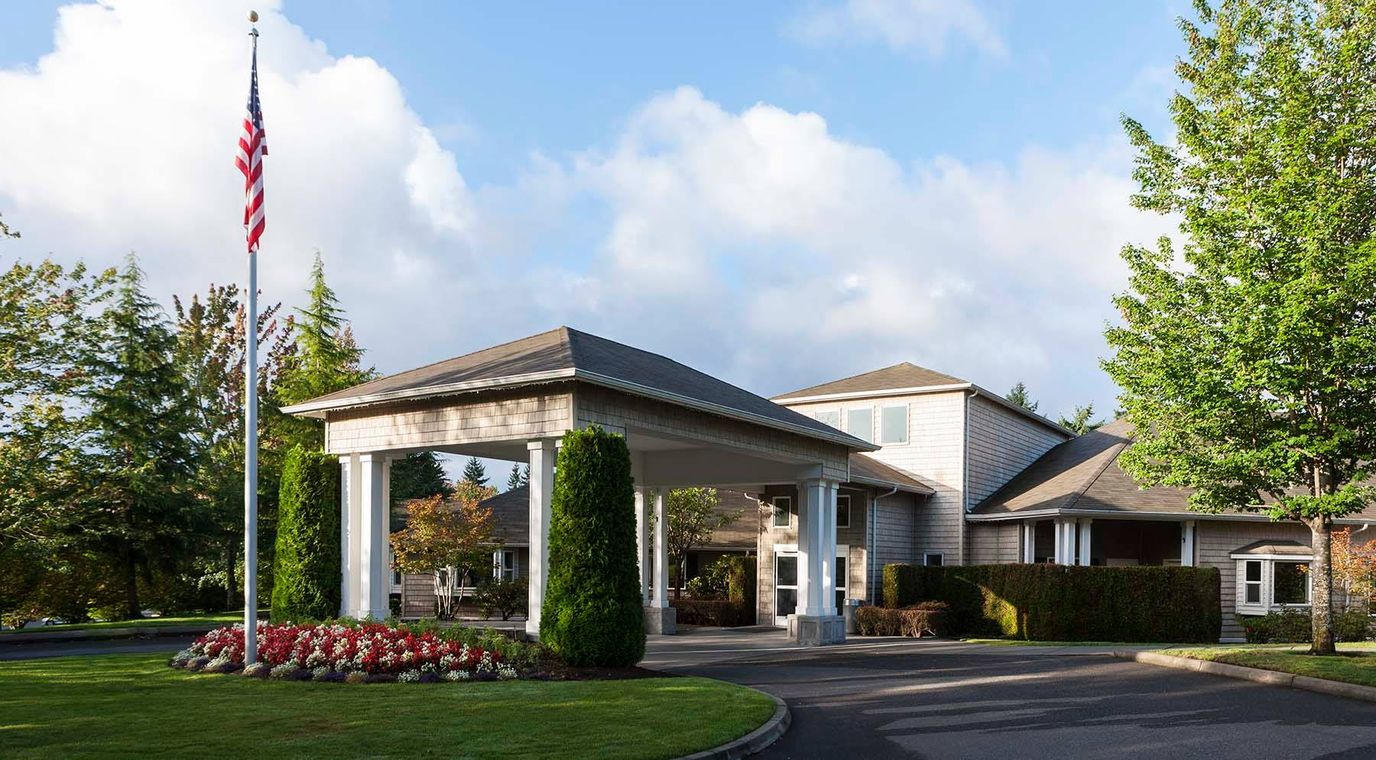 Front entrance of Avalon Federal Way Care Center with landscaping