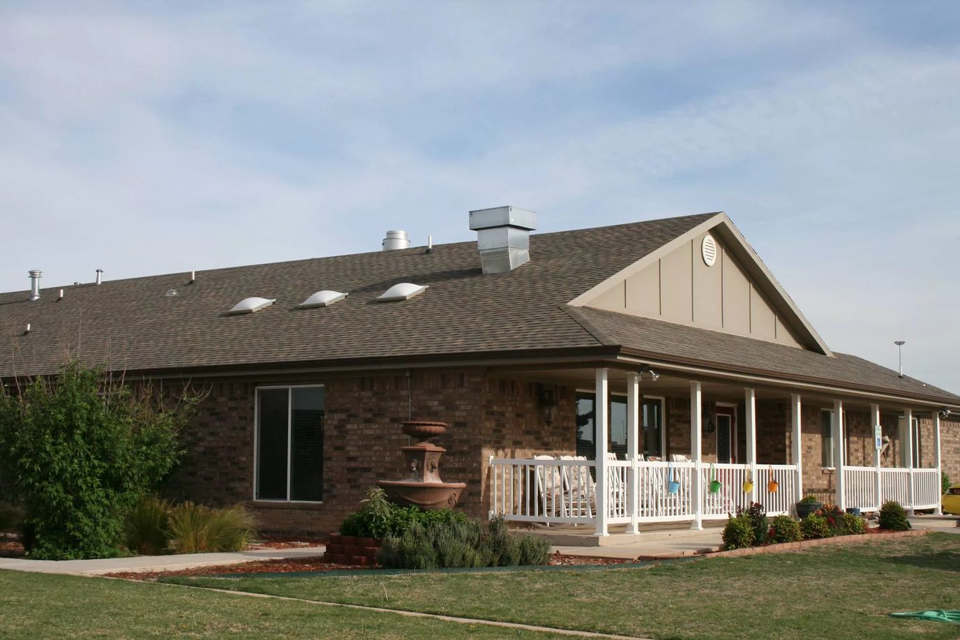 Building exterior of Beehive Homes with porch