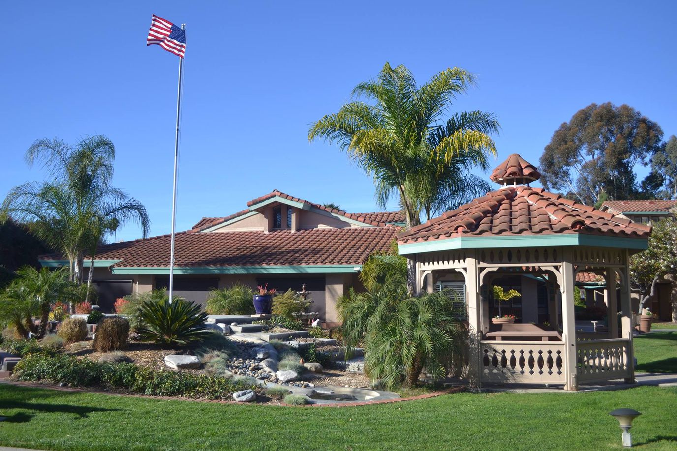 Beautiful outdoor space with gazebo and landscaping