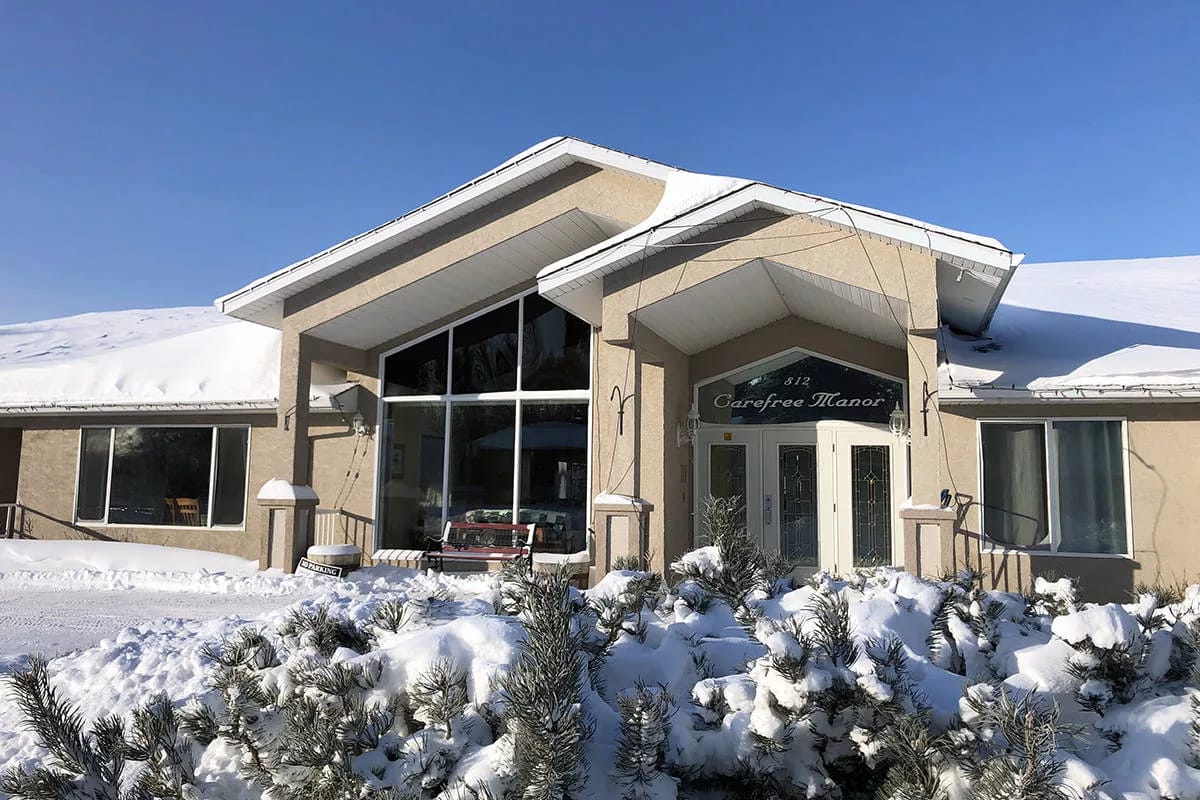 Exterior view of Carefree Manor in winter