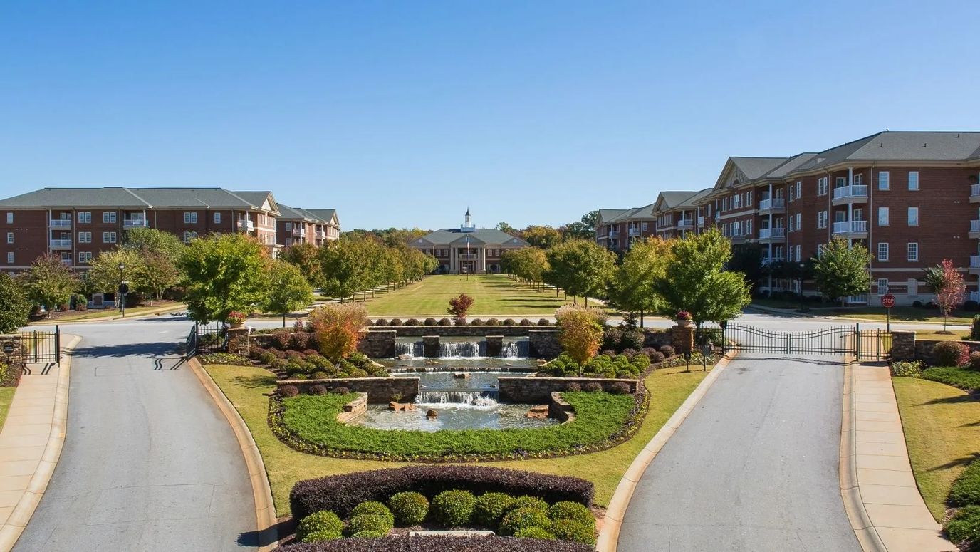 A landscaped entrance view of the Cascades Verdae community
