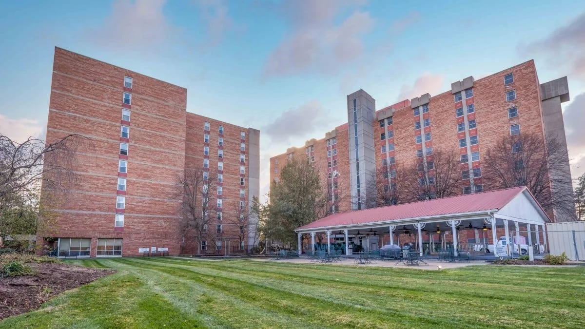 Exterior view of the facility with landscaped grounds