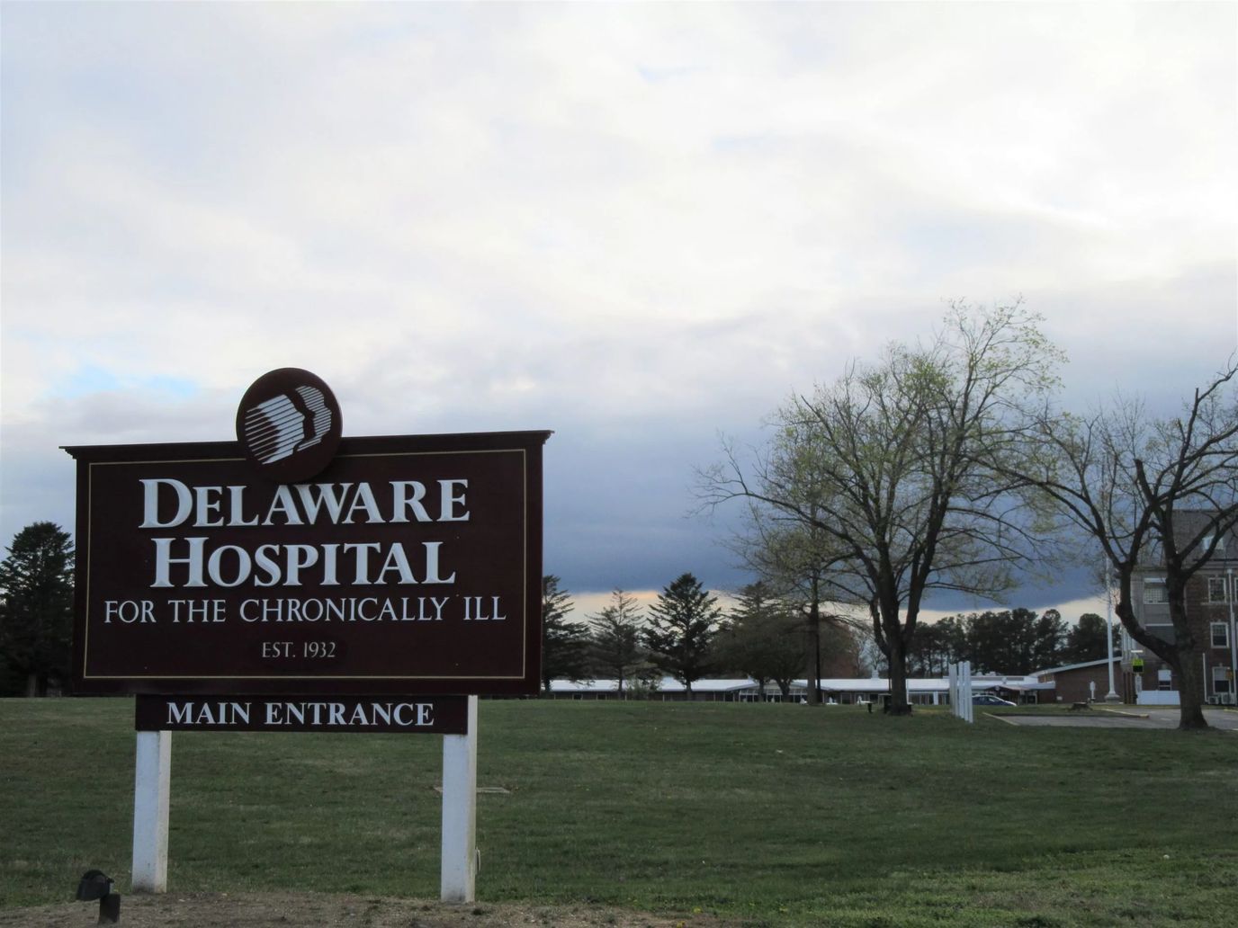 Main entrance sign of the Delaware Hospital for the Chronically Ill