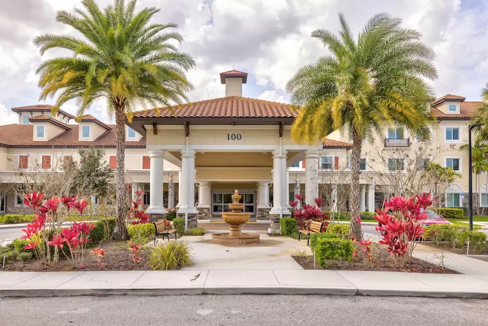 Exterior view of the facility entrance with landscaped areas