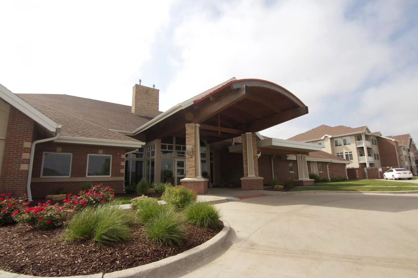 Entrance view of Elk Ridge Village with landscaping