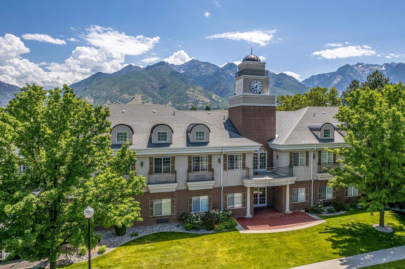 Aerial view of the assisted living facility with mountains