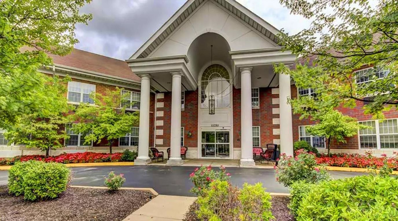 Exterior view of Estates of Hidden Lake with landscaped gardens