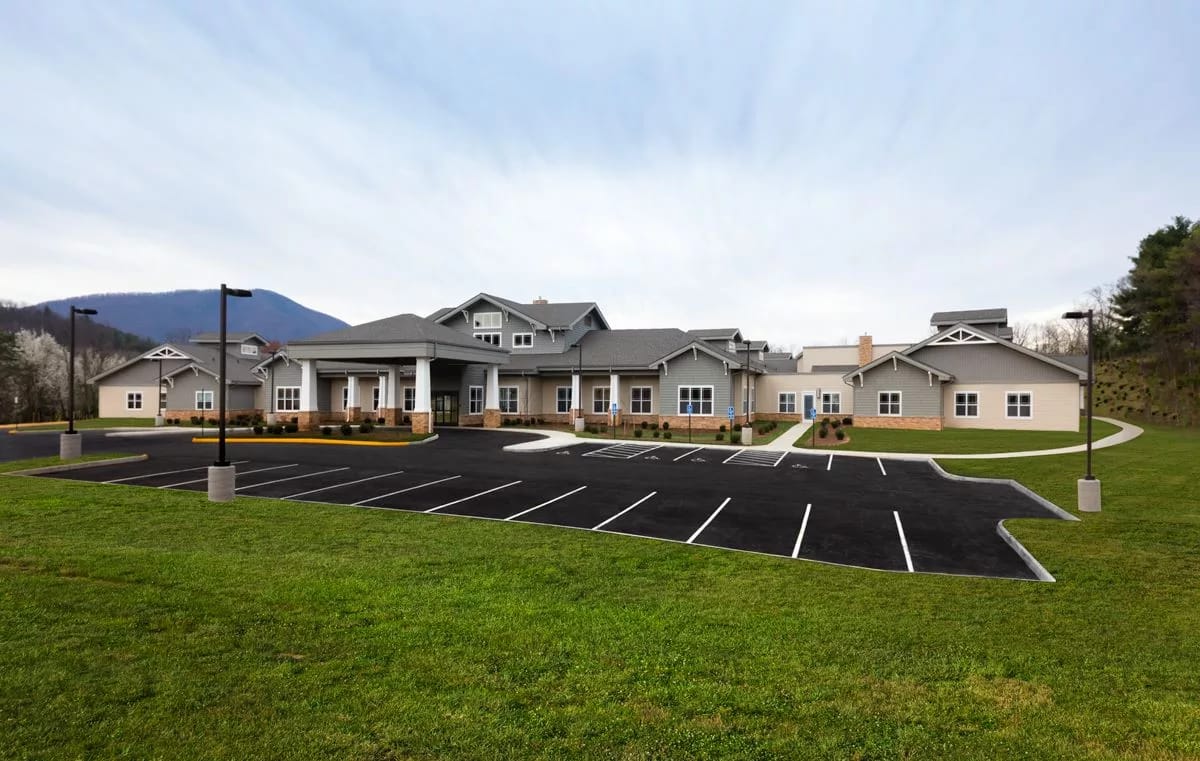 Exterior view of Friendship Retirement Community with landscaped grounds
