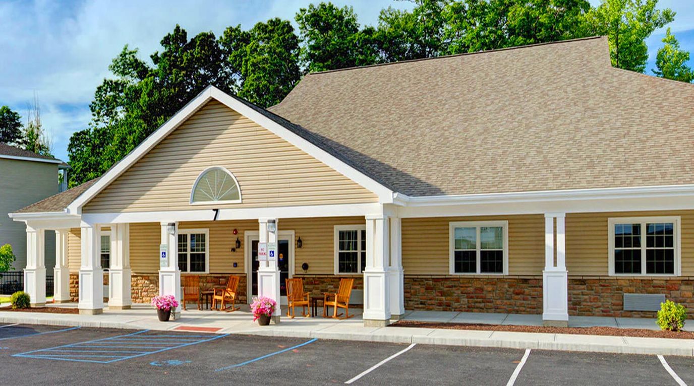 Exterior view of Glenmont Abbey Village building