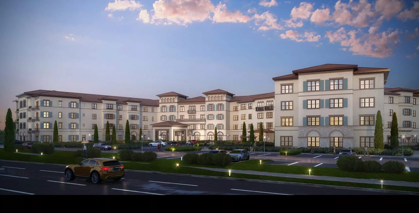 Exterior view of Grand Living at Tuscan Lakes at dusk