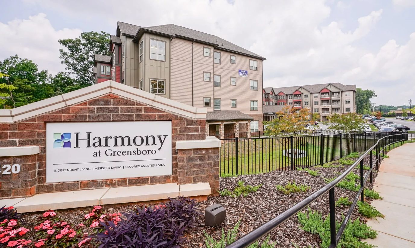 Exterior view of Harmony at Greensboro with landscaping