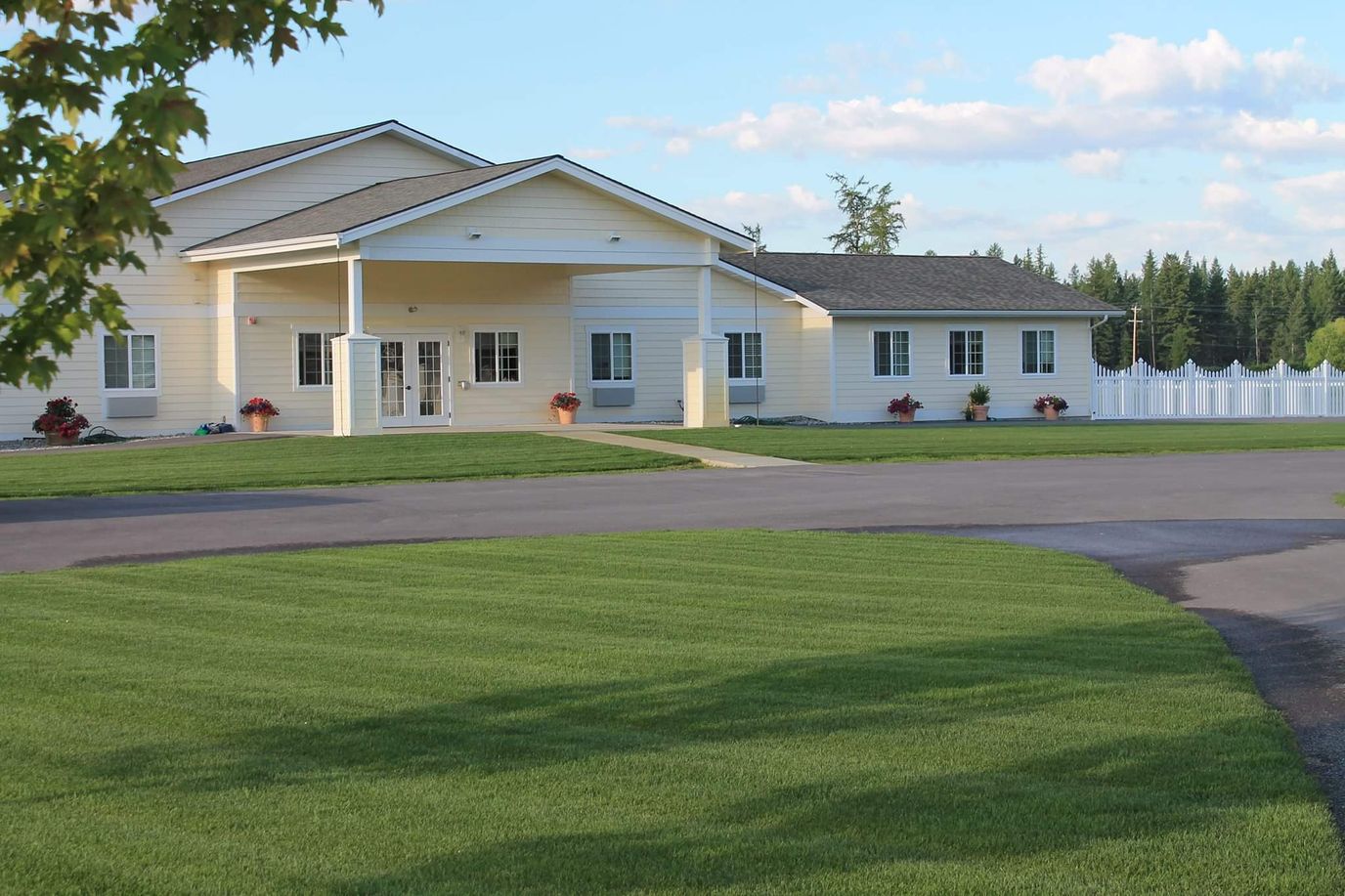 Exterior view of Hidden Meadows building and lawn