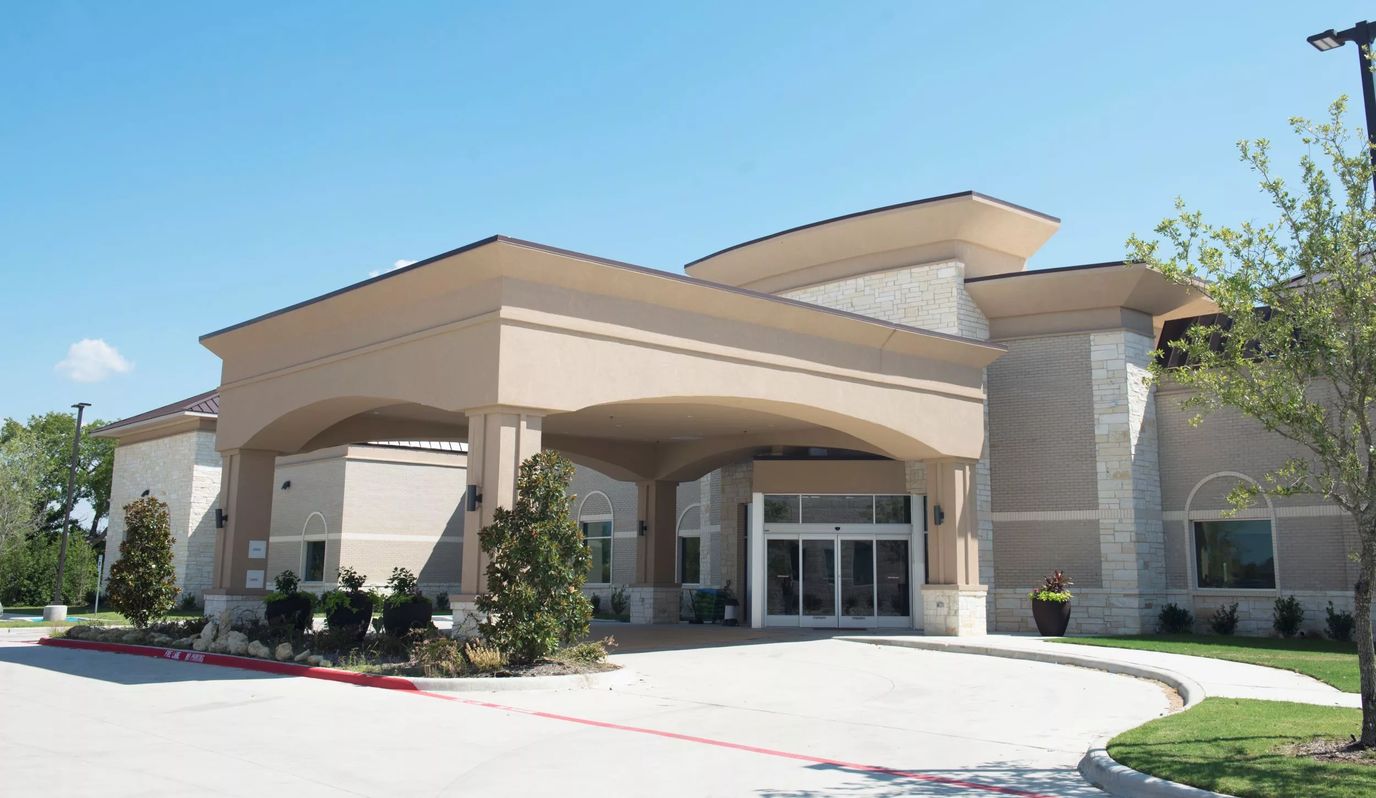Exterior view of the Highlands Village Senior Living facility